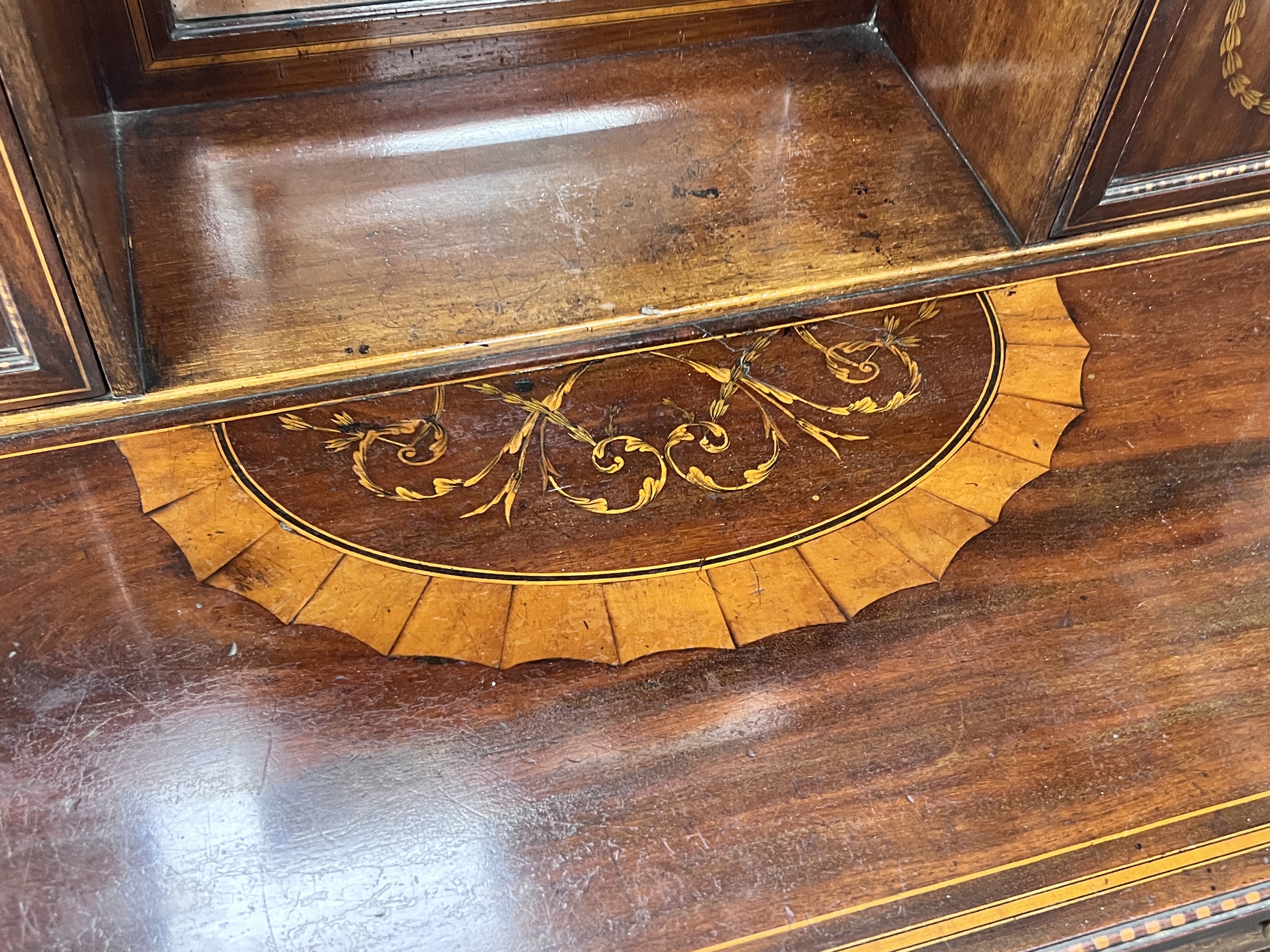 An Edwardian marquetry inlaid mahogany bonheur du jour, in the manner of Edwards & Roberts, width 92cm, depth 52cm, height 118cm